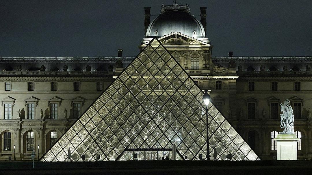 Activists Display Andrew Mountbatten-Windsor Photo at Louvre Museum