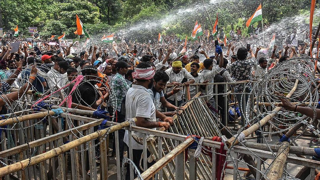 India: Police Clash With Exam Fraud Protesters