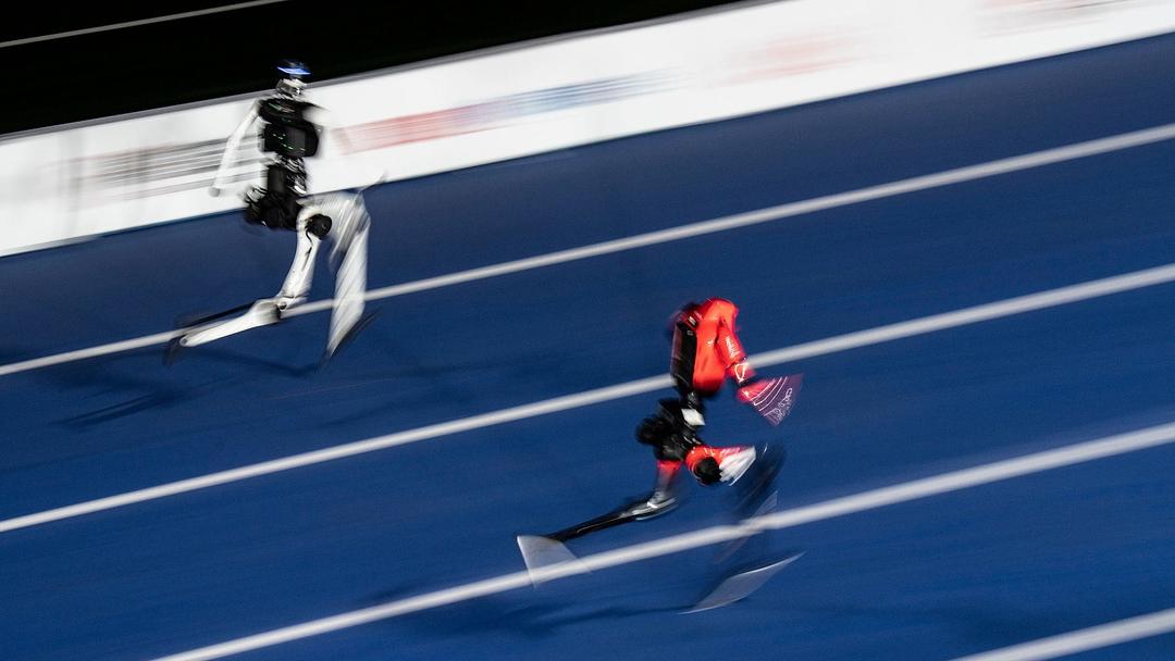 Chinese Robots Break Bolt's 100M Record at Beijing Games