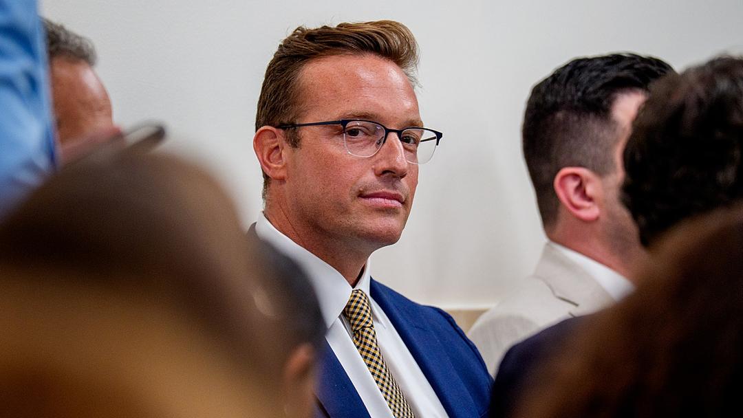 Protesters Sue Podcaster Benny Johnson