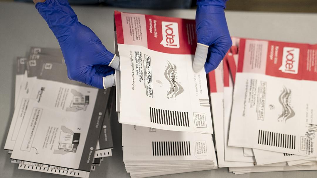 DOJ Asks Washington to Set Aside 400+ Voters' Ballots